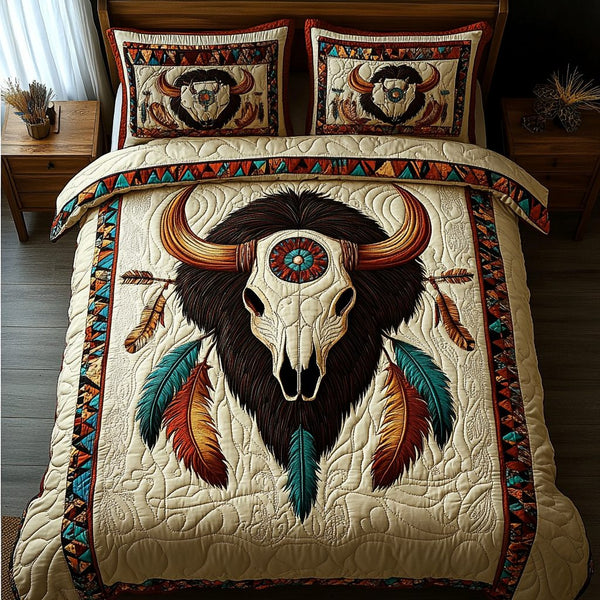 Sacred Feather quilted 3-piece bedding set on a made bed in a softly lit bedroom