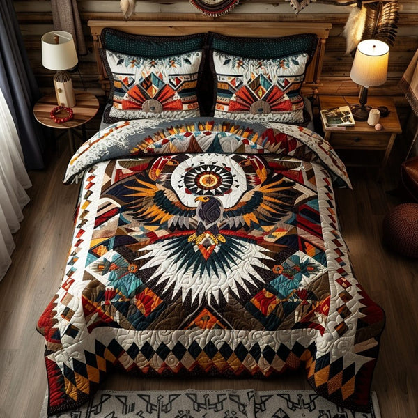Sacred Flight quilted 3-piece bedding set on a made bed in a softly lit bedroom