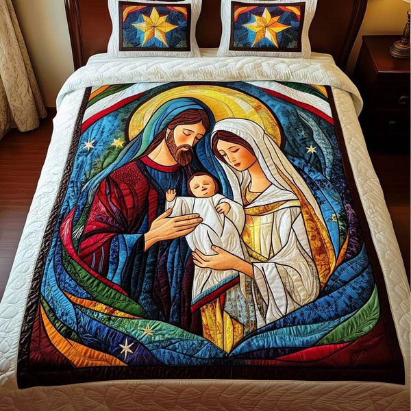 Sacred Harmony quilted 3-piece bedding set on a made bed in a softly lit bedroom
