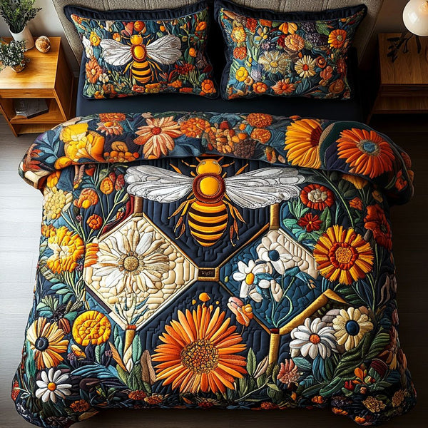 Sacred Hive quilted 3-piece bedding set on a made bed in a softly lit bedroom