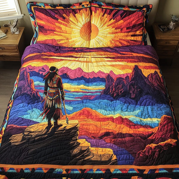 Sacred Lands quilted 3-piece bedding set on a made bed in a softly lit bedroom