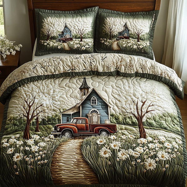 Sacred Meadow quilted 3-piece bedding set on a made bed in a softly lit bedroom