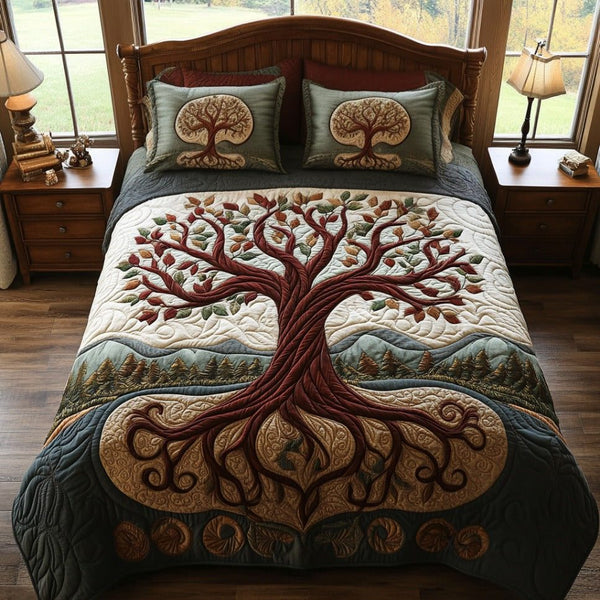 Sacred Roots quilted 3-piece bedding set on a made bed in a softly lit bedroom