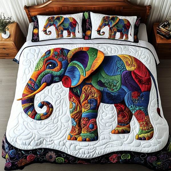 Sacred Trunk quilted 3-piece bedding set on a made bed in a softly lit bedroom