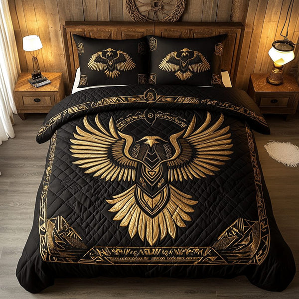 Sacred Wings quilted 3-piece bedding set on a made bed in a softly lit bedroom