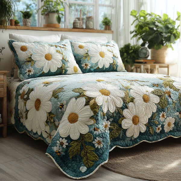 Sage Daisy Garden quilted 3-piece bedding set on a made bed with two matching pillow shams
