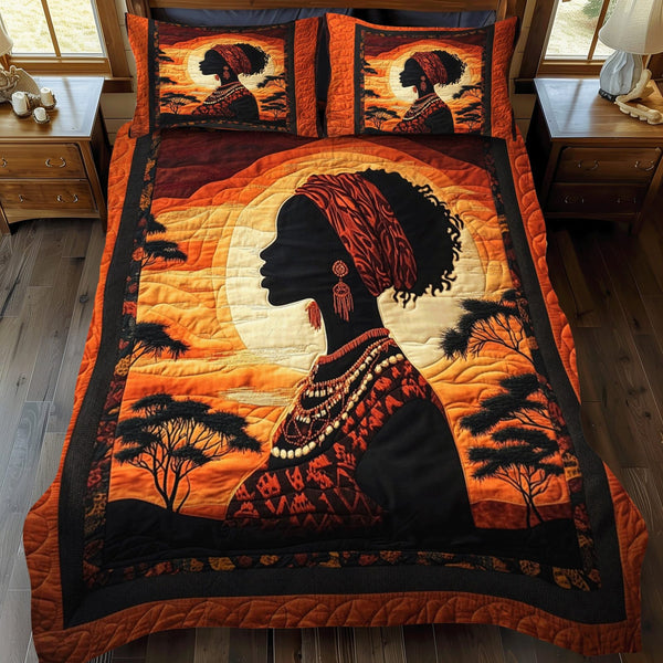 Sahara Muse quilted 3-piece bedding set on a made bed with two matching pillow shams