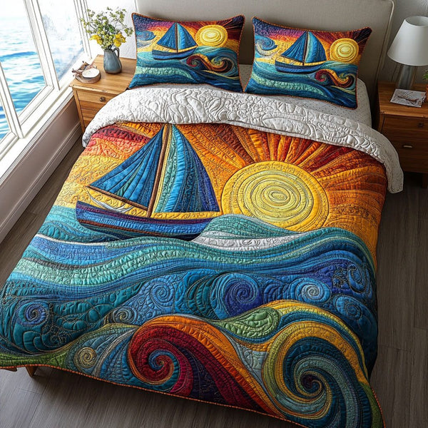 Sail Into the Sunset quilted 3-piece bedding set on a made bed in a light coastal bedroom