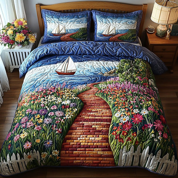 Sailwind Dreams quilted 3-piece bedding set on a made bed with two matching pillow shams