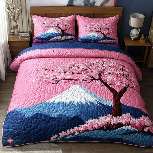 Sakura Vista quilted 3-piece bedding set on a made bed with two matching pillow shams