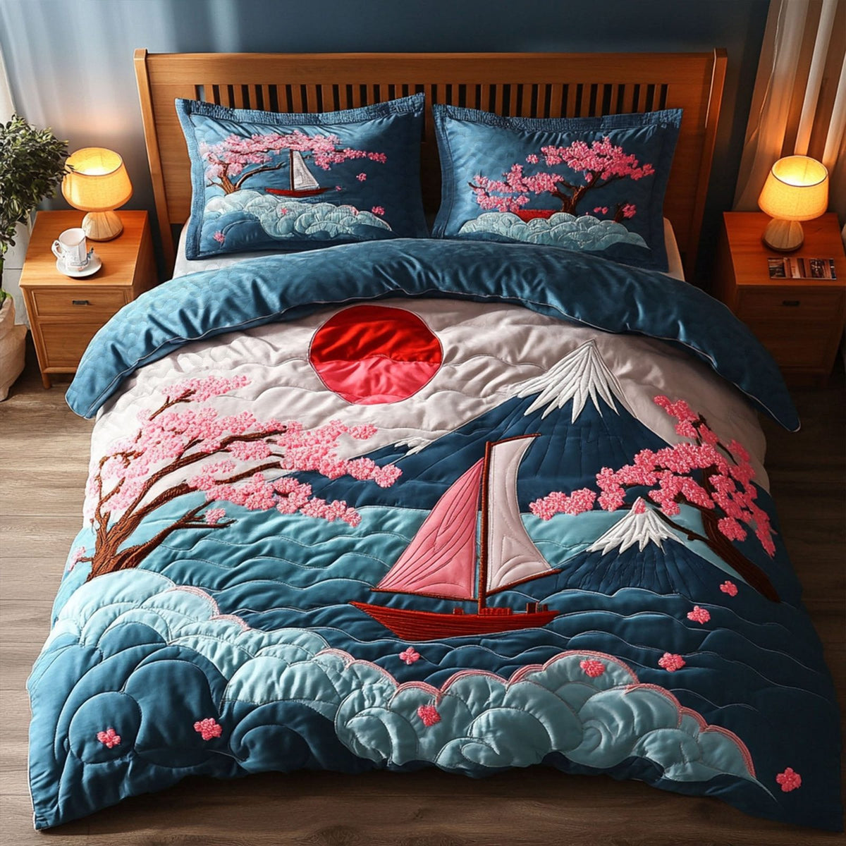 Sakura Waters quilted 3-piece bedding set on a made bed with two matching pillow shams