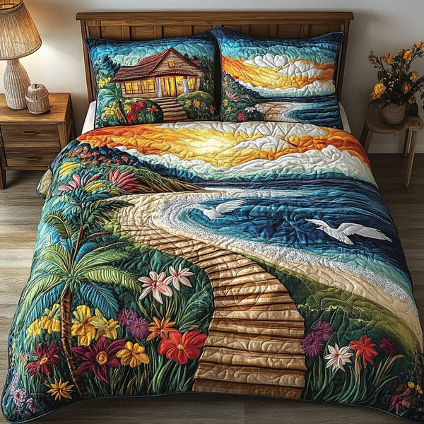 Sandy Shore quilted 3-piece bedding set on a made bed in a light coastal bedroom