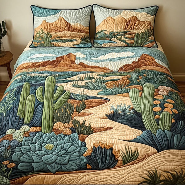 Sandy Trails quilted 3-piece bedding set on a made bed with two matching pillow shams