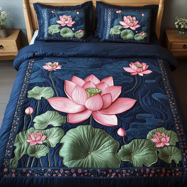 Sapphire Bloom quilted 3-piece bedding set on a made bed with two matching pillow shams