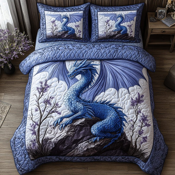 Sapphire Claw quilted 3-piece bedding set on a made bed with two matching pillow shams