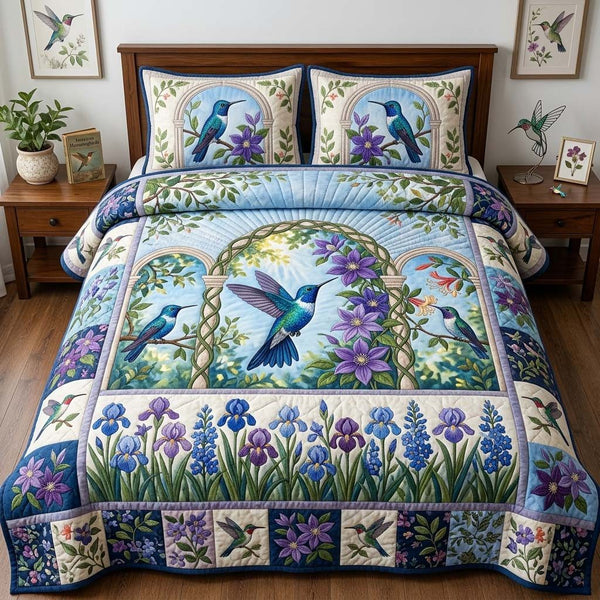 Sapphire Vine Sanctuary quilted 3-piece bedding set on a made bed with two matching pillow shams
