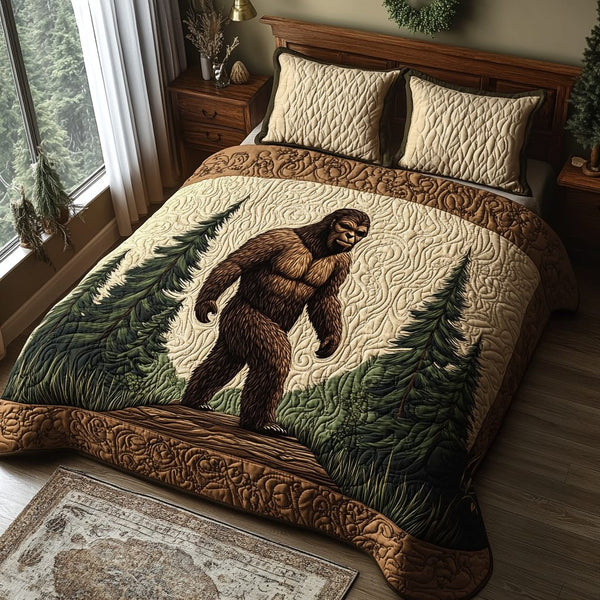 Sasquatch Grove quilted 3-piece bedding set on a made bed with two matching pillow shams