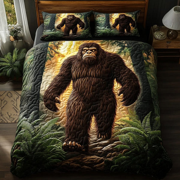 Sasquatch Slumber quilted 3-piece bedding set on a made bed with two matching pillow shams