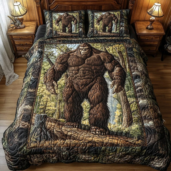 Sasquatch Woodland Trail quilted 3-piece bedding set on a made bed with two matching pillow shams