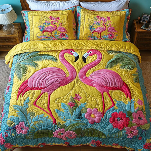 Sassy Flamingo quilted 3-piece bedding set on a made bed with two matching pillow shams