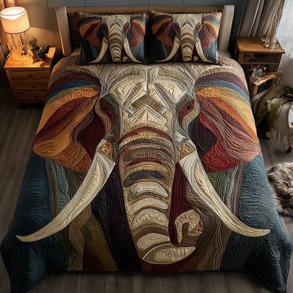 Savanna Sunset quilted 3-piece bedding set on a made bed with two matching pillow shams