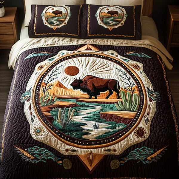 Savannah Calm quilted 3-piece bedding set on a made bed with two matching pillow shams