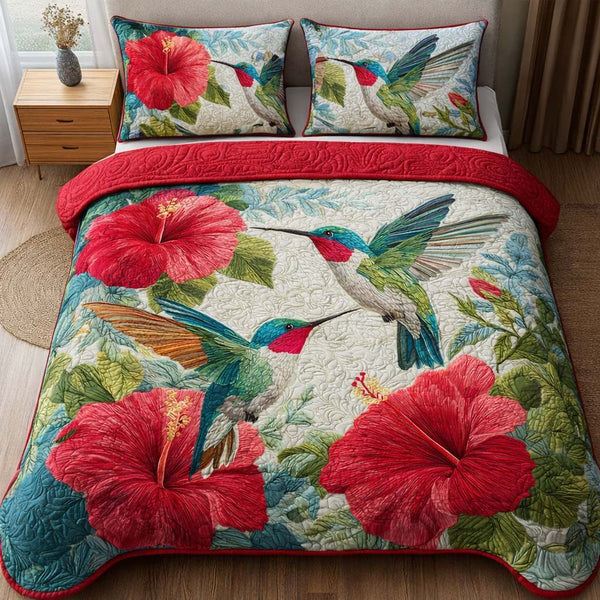 Scarlet Bloom quilted 3-piece bedding set on a made bed with two matching pillow shams