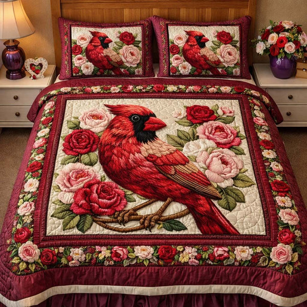 Scarlet Rose Cardinal quilted 3-piece bedding set on a made bed with two matching pillow shams