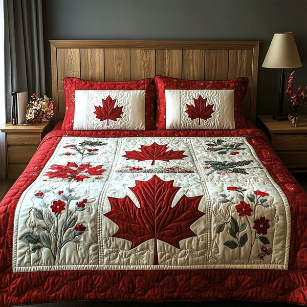 Scarlet Serenity quilted 3-piece bedding set on a made bed with two matching pillow shams