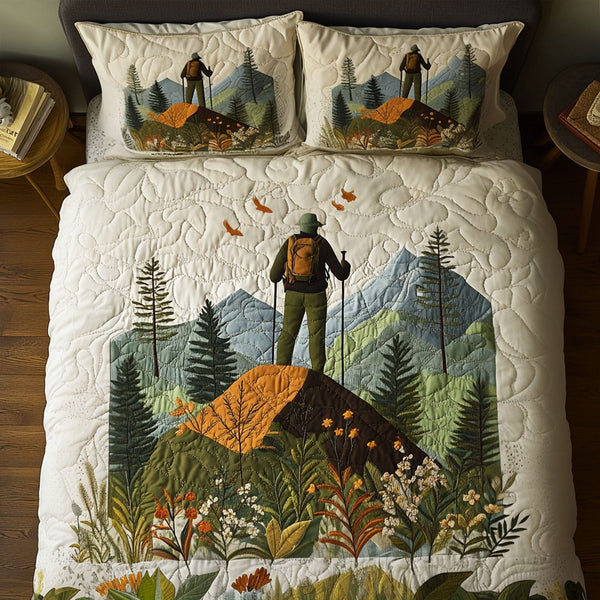 Scenic Trail quilted 3-piece bedding set on a made bed with two matching pillow shams