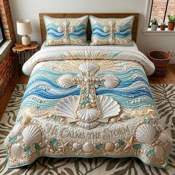 Sea Escape quilted 3-piece bedding set on a made bed in a light coastal bedroom