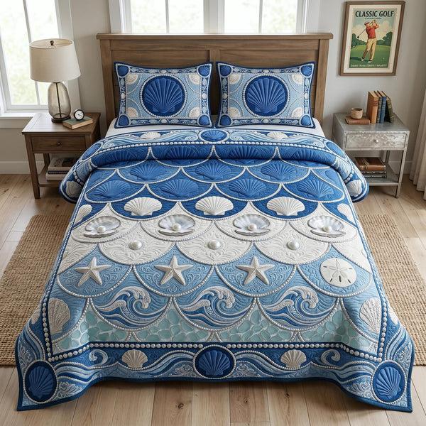 Sea Escape quilted 3-piece bedding set on a made bed in a light coastal bedroom