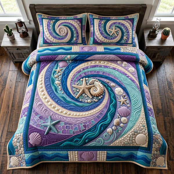 Sea Escape quilted 3-piece bedding set on a made bed in a light coastal bedroom
