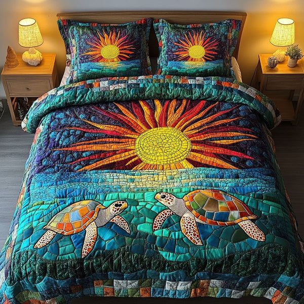 Sea Guardian quilted 3-piece bedding set on a made bed in a light coastal bedroom