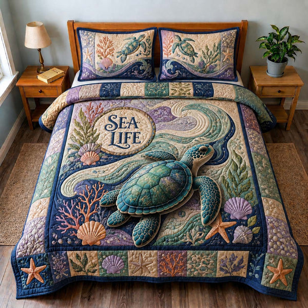 Sea Life Turtle quilted 3-piece bedding set on a made bed in a light coastal bedroom