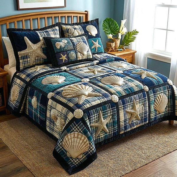 Sea Serenity quilted 3-piece bedding set on a made bed in a light coastal bedroom