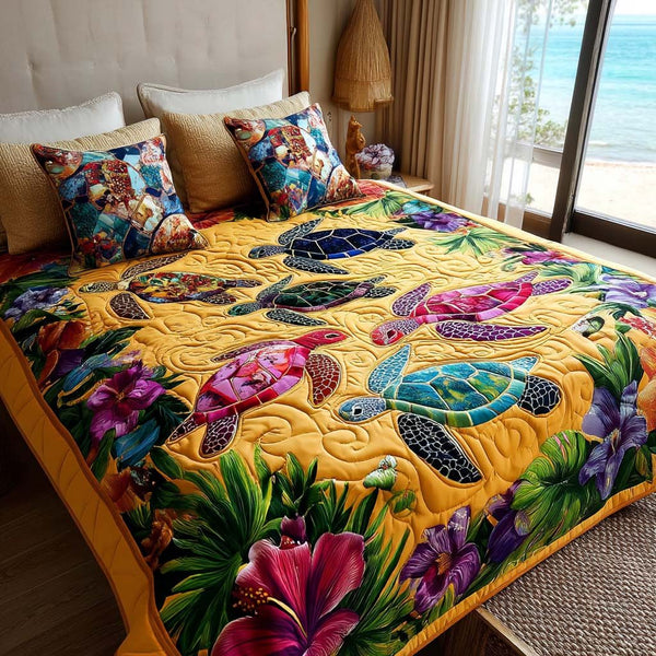Sea Turtle Glow quilted 3-piece bedding set on a made bed in a light coastal bedroom