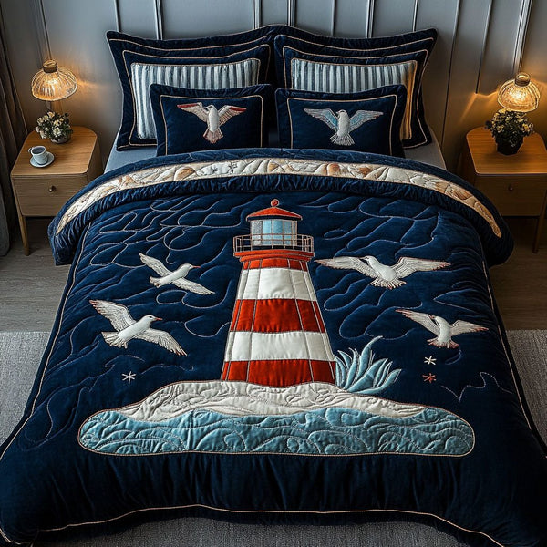 Seagull Watchtower quilted 3-piece bedding set on a made bed in a light coastal bedroom