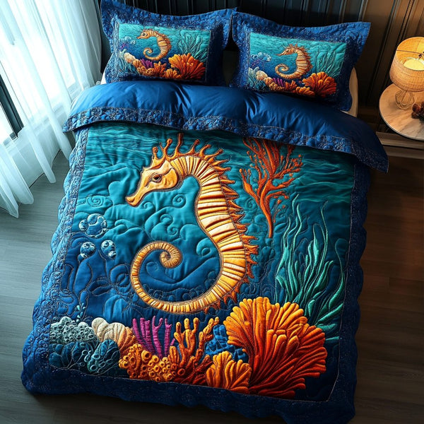 Seahorse quilted 3-piece bedding set on a made bed in a light coastal bedroom