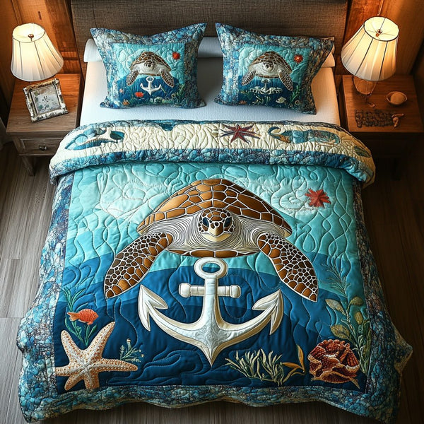 Seashell Odyssey quilted 3-piece bedding set on a made bed in a light coastal bedroom