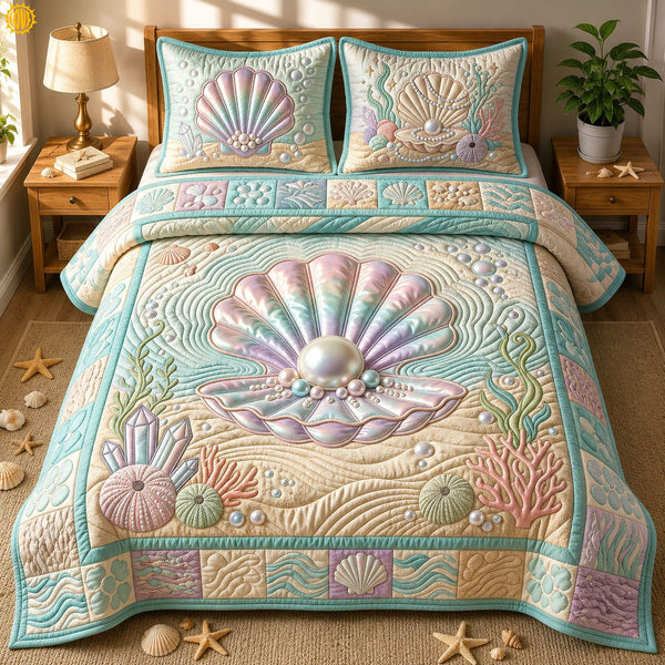 Seashell Treasures quilted 3-piece bedding set on a made bed in a light coastal bedroom