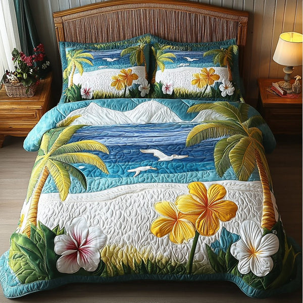 Seaside Bloom quilted 3-piece bedding set on a made bed in a light coastal bedroom