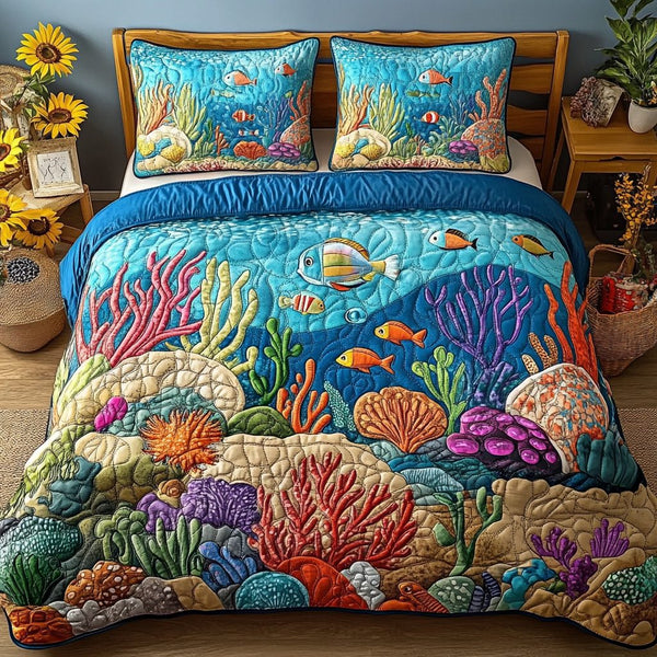 Seaside Dreams quilted 3-piece bedding set on a made bed in a light coastal bedroom
