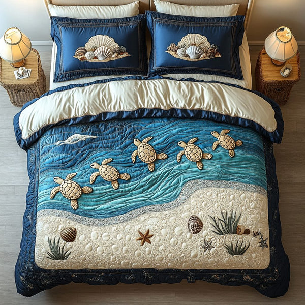Seaside Guardian quilted 3-piece bedding set on a made bed in a light coastal bedroom