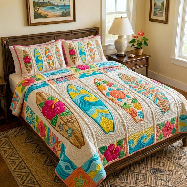 Seaside Living quilted 3-piece bedding set on a made bed in a light coastal bedroom