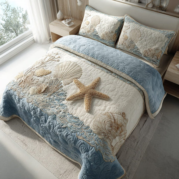 Seaside Ocean quilted 3-piece bedding set on a made bed in a light coastal bedroom