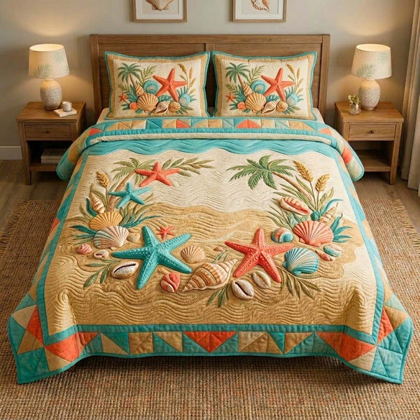 Seaside Shell Dream quilted 3-piece bedding set on a made bed in a light coastal bedroom