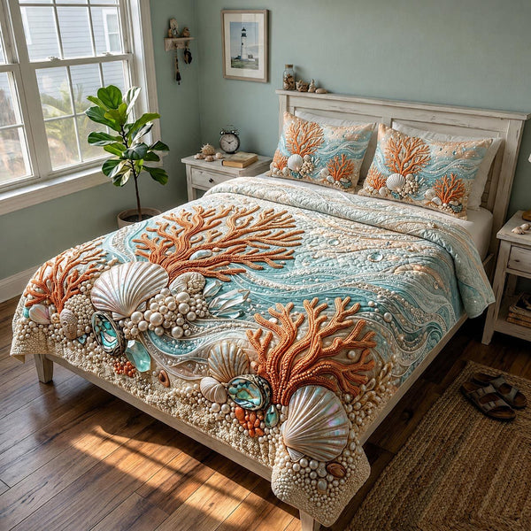 Seaside Whisper quilted 3-piece bedding set on a made bed in a light coastal bedroom