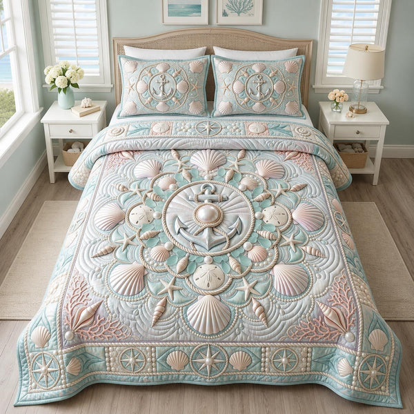 Seaside Whisper quilted 3-piece bedding set on a made bed in a light coastal bedroom