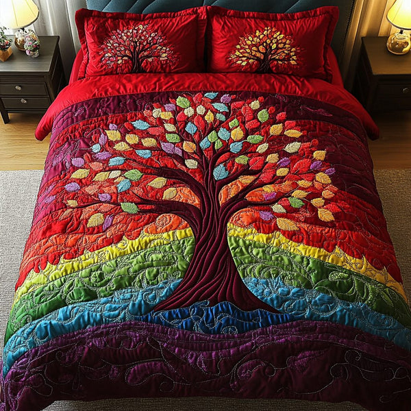 Seasons of Growth quilted 3-piece bedding set on a made bed with two matching pillow shams